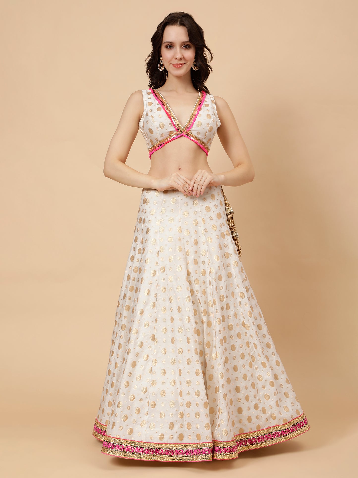 White silk lehenga with zari booties and Pink chunni